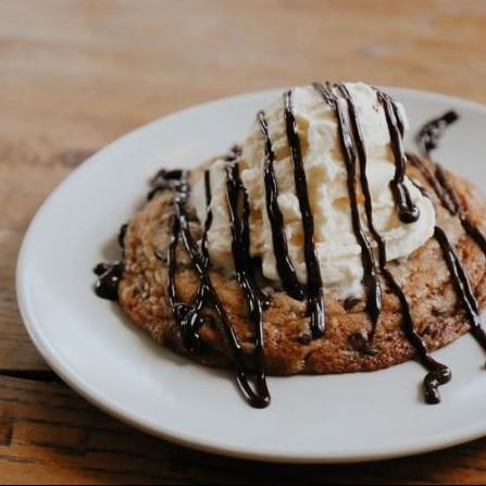 Chocolate chip cookie with iced cream on top