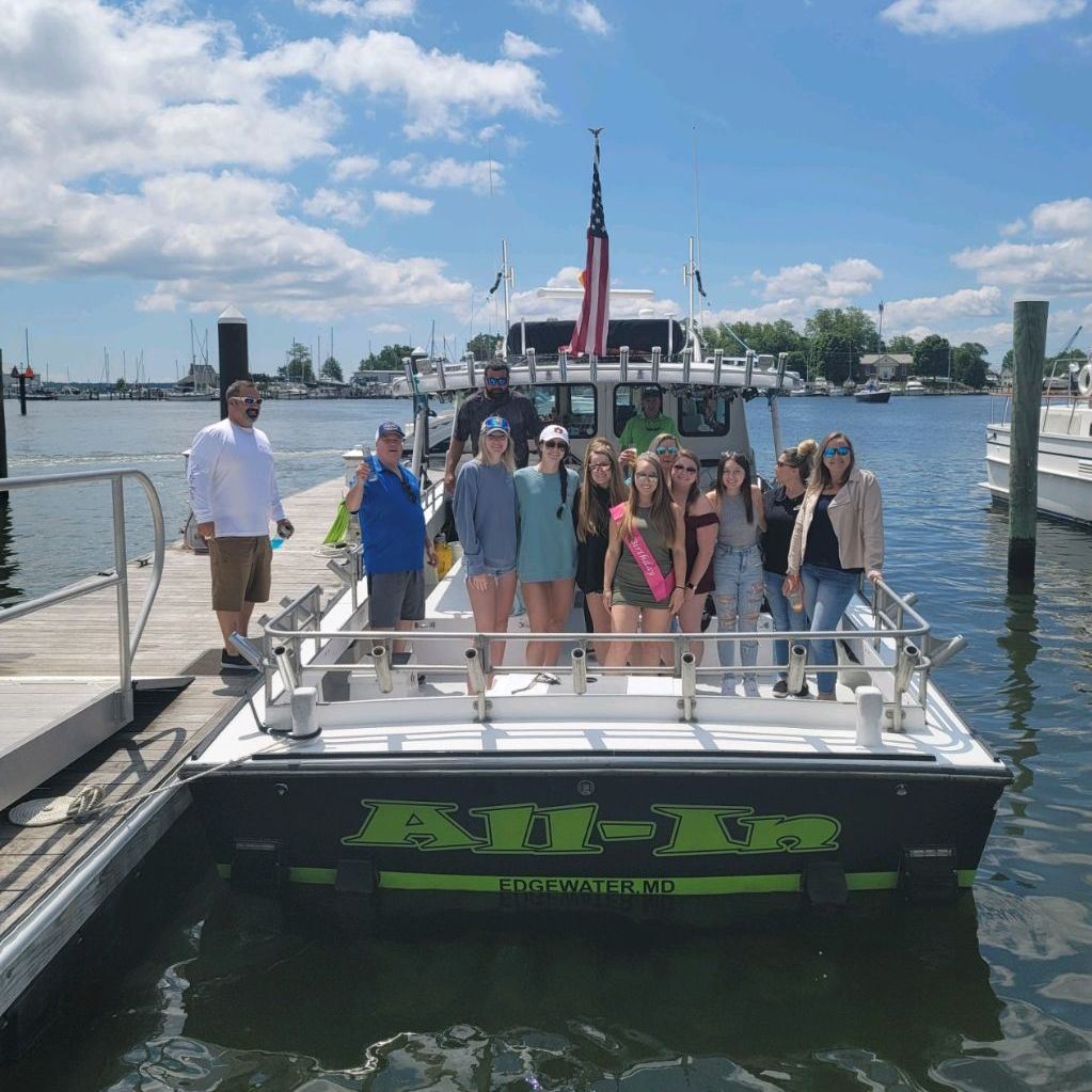 Group of people on an All In charter fishing boat