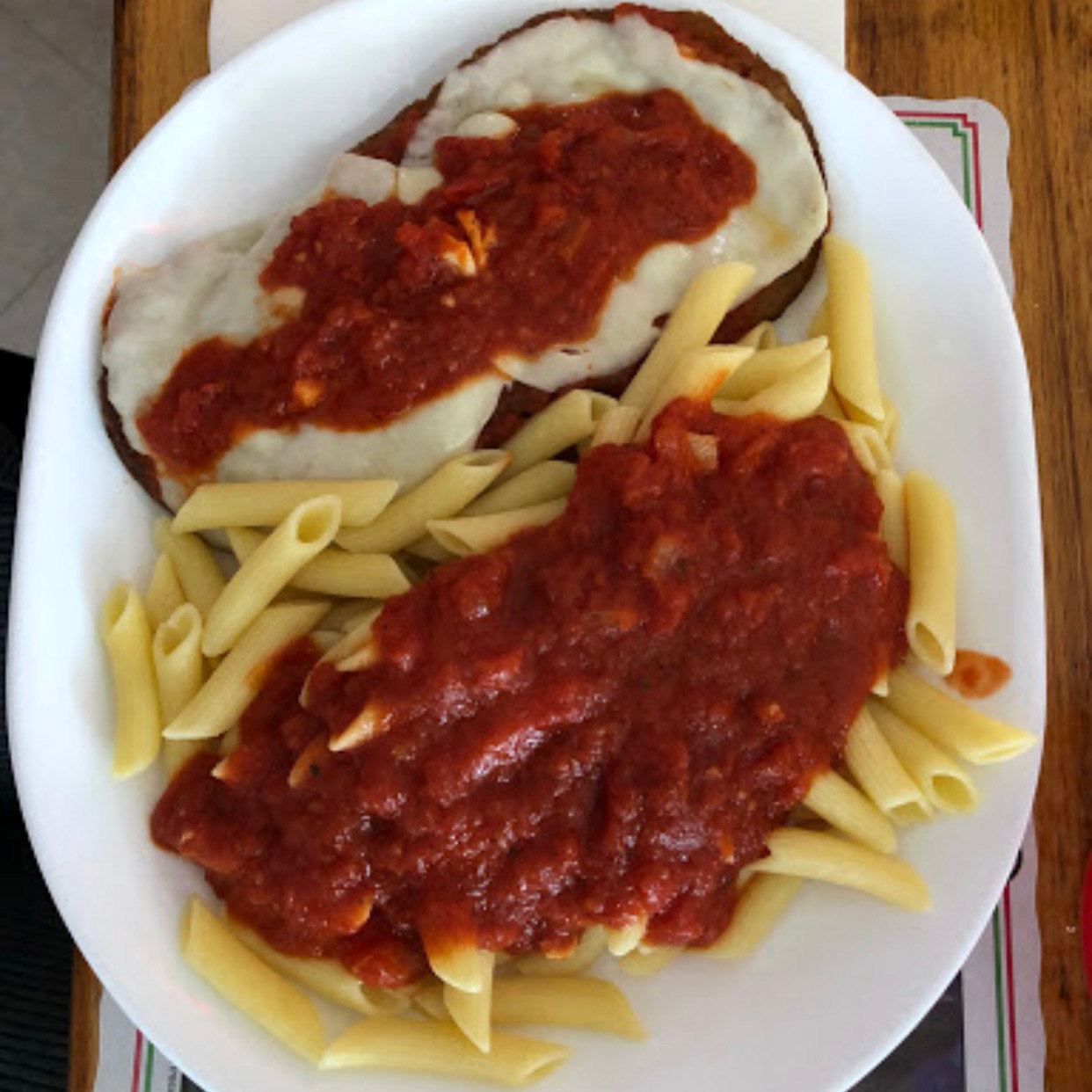 Chicken parmesan and pasta with red sauce