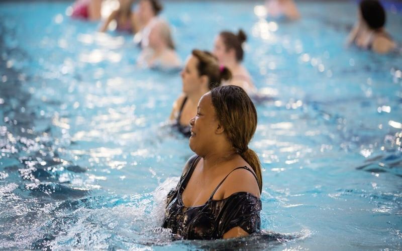 Ladies in water fitness class